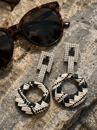Black cream rhinestone earrings